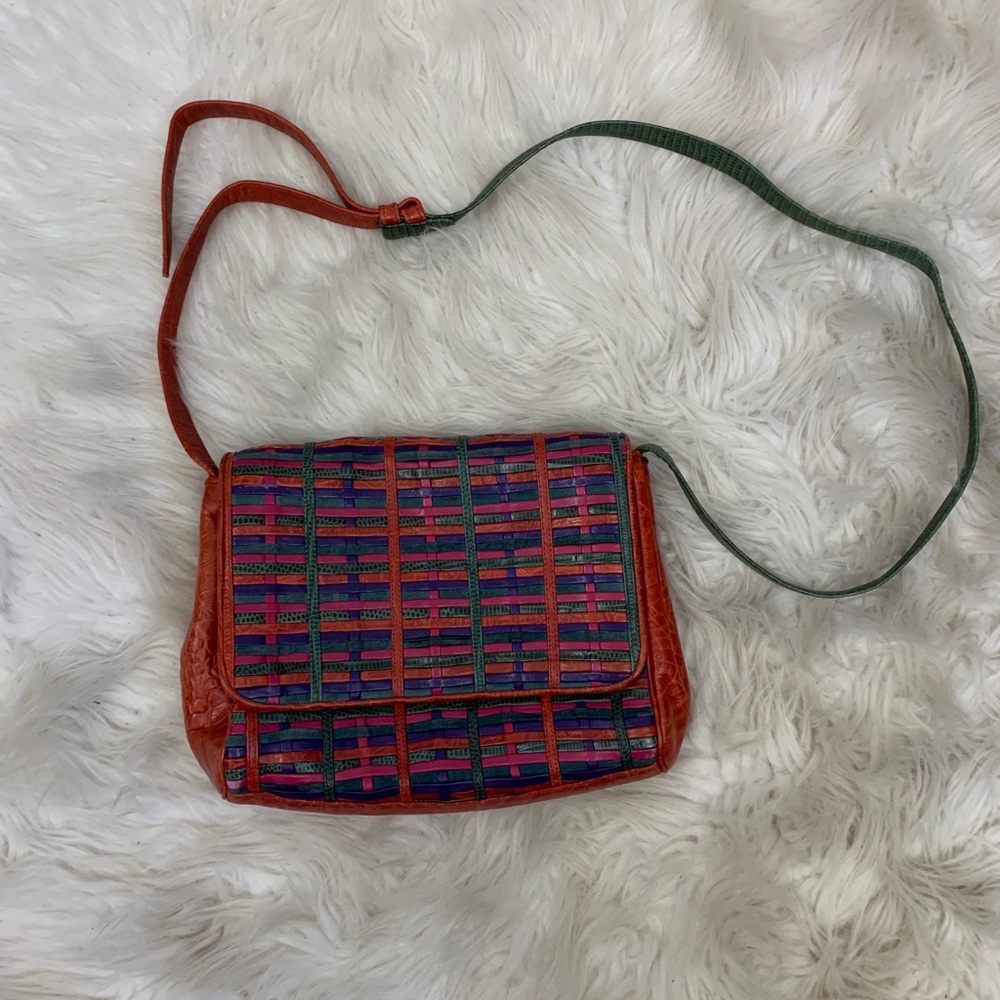Vintage multi colored leather cross bossy bag.